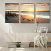 Tríptico paisaje de mar en tonos cálidos ideal para decoraciones relajantes.