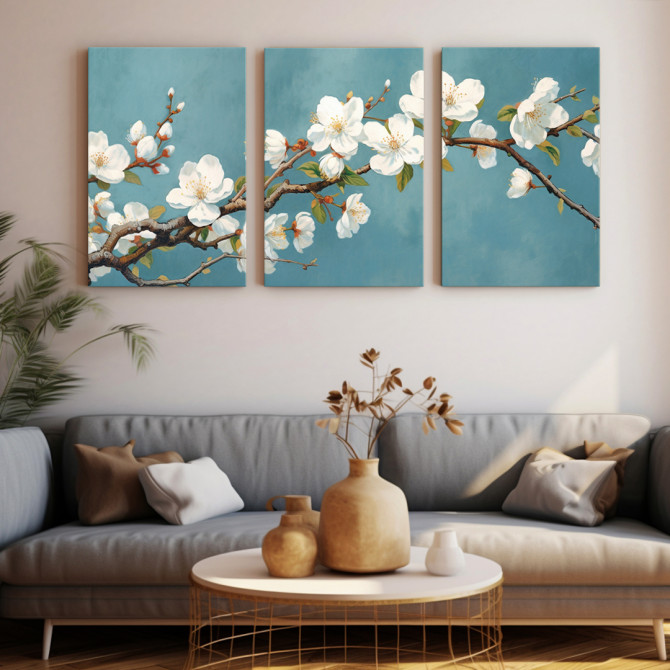 Tríptico floral con ramas de cerezo en flor sobre fondo azul turquesa. - Cuadrostock