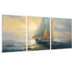 Tríptico decorativo con un velero navegando al atardecer en tonos dorados y azules- Cuadrostock