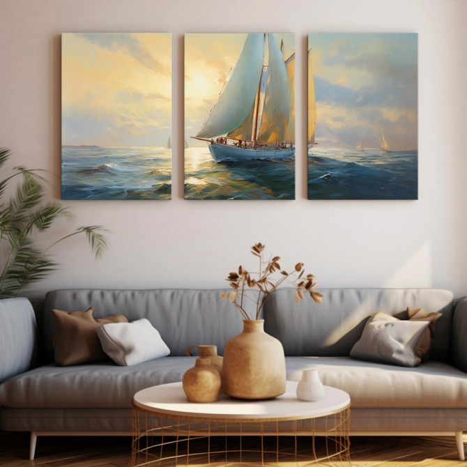 Tríptico decorativo con un velero navegando al atardecer en tonos dorados y azules- Cuadrostock