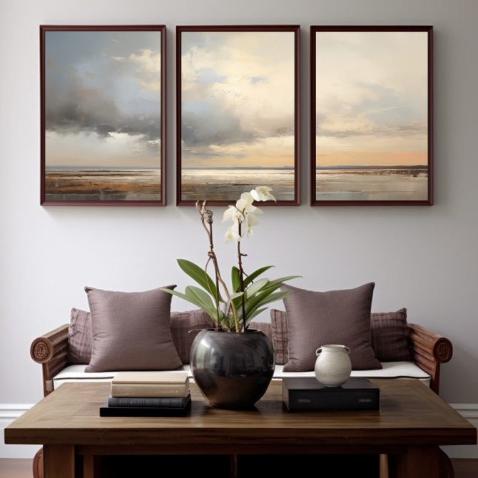 Tríptico decorativo de paisaje marino con arena, agua y cielo en tonos suaves y nublados- Cuadrostock