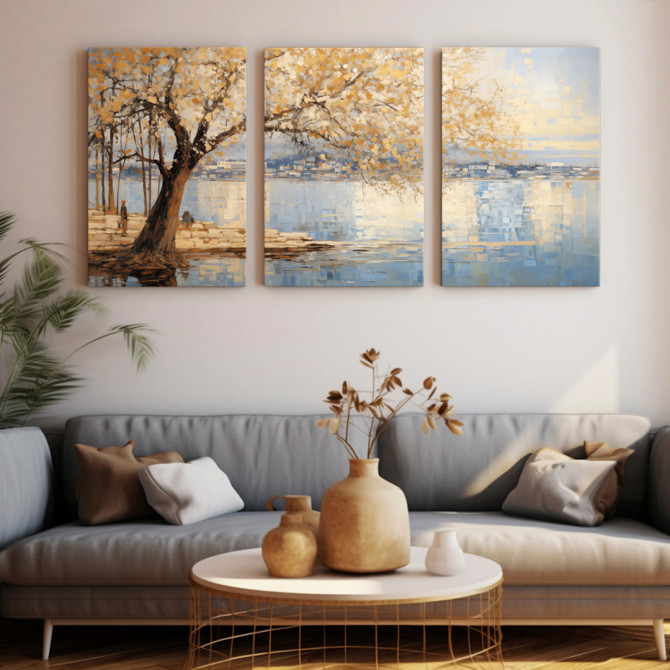 Tríptico decorativo de paisaje otoñal junto a un lago, con árbol de hojas doradas y reflejos en el agua.