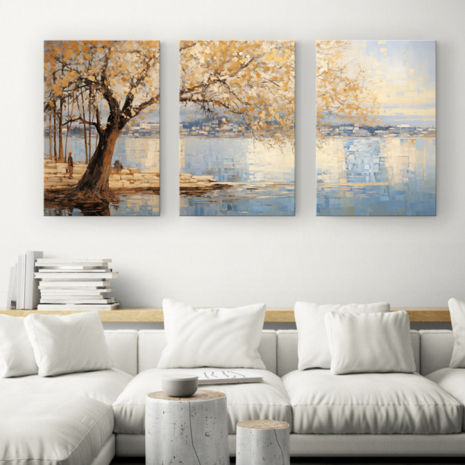 Tríptico decorativo de paisaje otoñal junto a un lago, con árbol de hojas doradas y reflejos en el agua.
