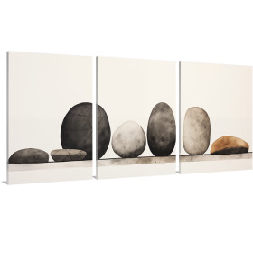 Tríptico minimalista con piedras redondeadas en equilibrio sobre fondo claro. - Cuadrostock