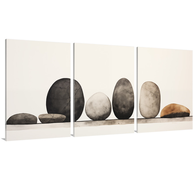 Tríptico minimalista con piedras redondeadas en equilibrio sobre fondo claro. - Cuadrostock